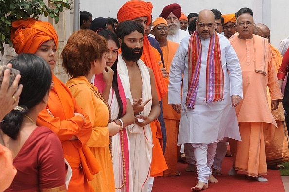 Amit Shah during a visit to Swami Vivekananda’s ancestral house in Kolkata. (Photo by Samir Jana/Hindustan Times via Getty Images)