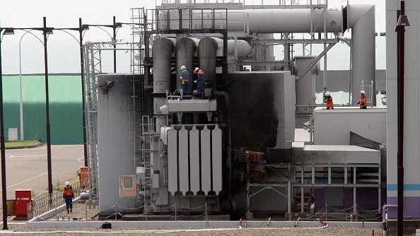 Japanese workers examining a nuclear power generation unit. (Koichi Kamoshida/Getty Images)