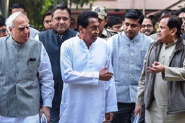 Lawyer Aljo K Joseph (second from right) with senior Congress leaders (@Aljokjoseph/Twitter)