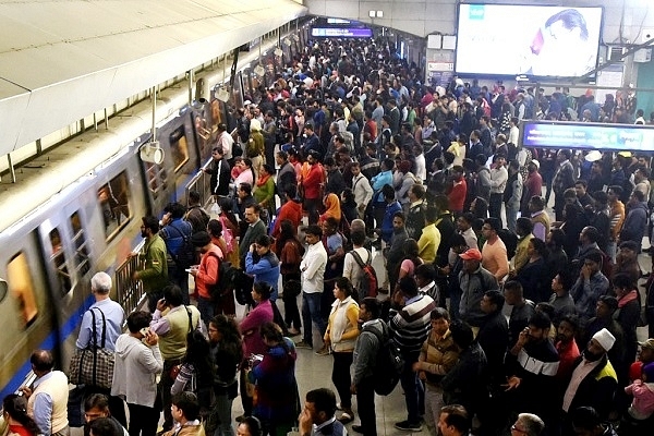 Passengers waiting for Delhi metro (Amal KS/Hindustan Times via Getty Images)