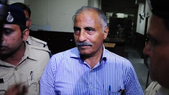 Arvind Joshi at a Bhopal court after surrendering in the disproportionate assets case (Mujeeb Faruqui/Hindustan Times via Getty Images)