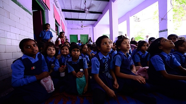 Children studying at a school in Delhi (Pradeep Gaur/Mint via Getty Images)