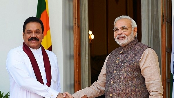 PM Modi (right) with Mahinda Rajapaksa (left) (Yasbant Negi/India Today Group/Getty Images)