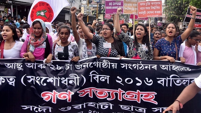  Activists of All-Assam Students Union (AASU) take part in a procession against proposal to provide citizenship to minorities from Bangladesh, Pakistan and Afghanistan in India (Rajib Jyoti Sarma/Hindustan Times via Getty Images)