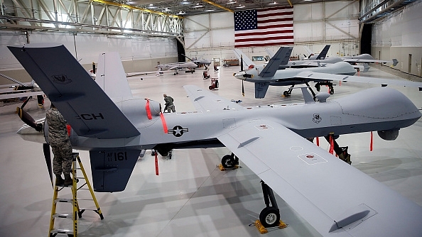 MQ-9 Reapers parked in a US Air Force hangar in Nevada (Isaac Brekken/Getty Images)