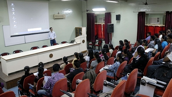 Students at a college classroom (Kalpak Pathak/Hindustan Times via Getty Images)