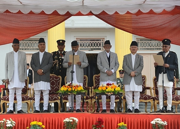 The swearing-in ceremony of newly-elected Nepalese Prime Minister K P Sharma Oli (R) on 12 October 2015.