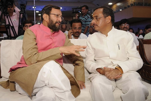  Union Minister for HRD Prakash Javadekar being greeted by UP deputy CM Dinesh Sharma at the CMS conference on Content of Education for the 21st century, on May 8, 2017 in Lucknow, India. (Photo by Ashok Dutta/Hindustan Times via Getty Images)