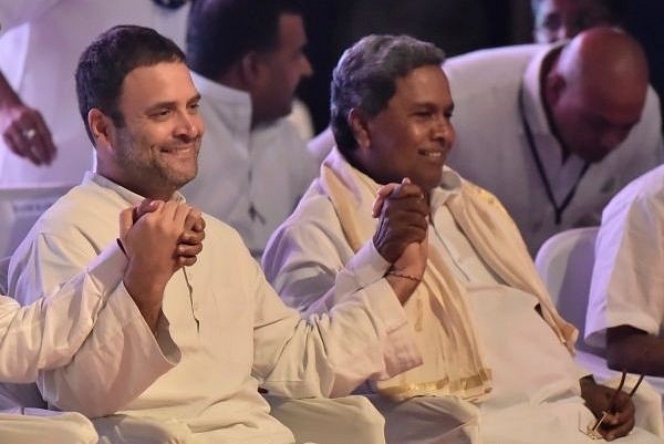 Congress President Rahul Gandhi and Ex-CM Siddaramaiah during Congress delegate meeting in Bengaluru. (Photo by Arijit Sen/Hindustan Times via Getty Images)