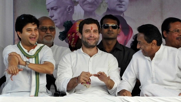 Congress President Rahul Gandhi (C) with Madhya Pradesh CM Kamal Nath (R) and Congress leader Jyotiraditya Scindia (L) (Arun Mondhe/Hindustan Times via Getty Images)