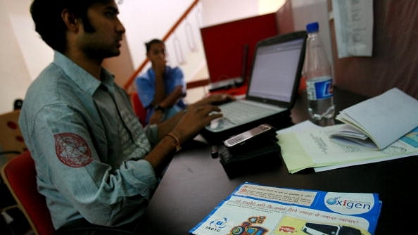 A redBus employee at the company’s Bengaluru headquarters (Representative image) (Uriel Sinai/Getty Images)