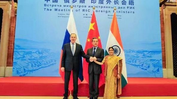 EAM Sushma Swaraj with her Chinese and Russian Counterpart ahead of the trilateral meeting (@MEAIndia/Twitter)