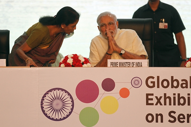 Prime Minister Narendra Modi with Finance Minister Nirmala Sitharaman. (Virendra Singh Gosain/Hindustan Times via GettyImages)&nbsp;