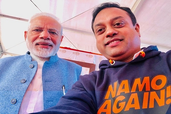 Sambit Patra (R) with PM Narendra Modi (L) (@sambitswaraj/Twitter)