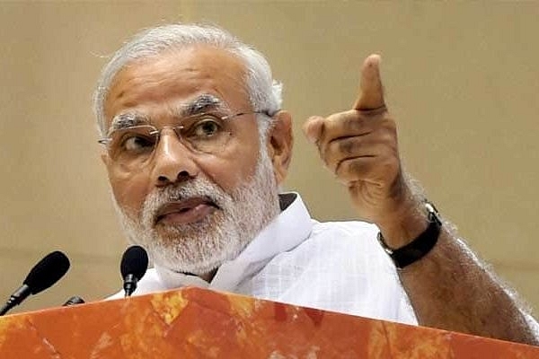 Prime Minister Narendra Modi speaking at an event.