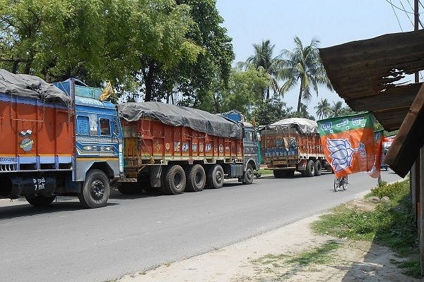 A BJP flag on a highway shop in Balurghat