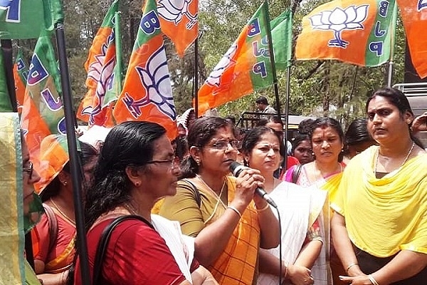 BJP Mahila Morcha protesting against accused professor (@ProfRemaBJP/Twitter)