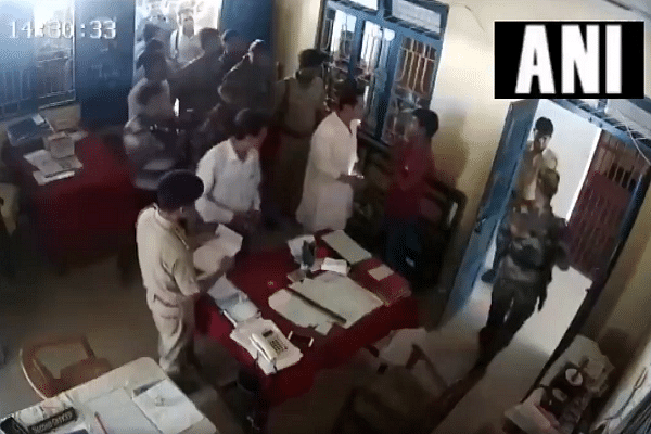 Pradyot Kishore Deb Barman inside the police station. (@ANI/Twitter)