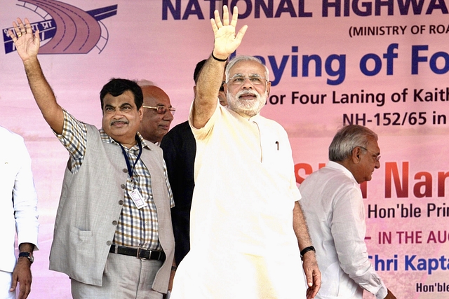 Prime Minster Narendra Modi with Union Minister of Road Transport and Highways, Nitin Gadkari. (Gurpreet Singh/Hindustan Times via Getty Images) 