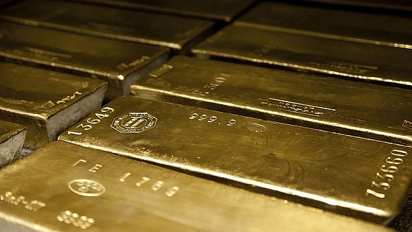 Gold bars arranged in rows. (Wikimedia Commons)