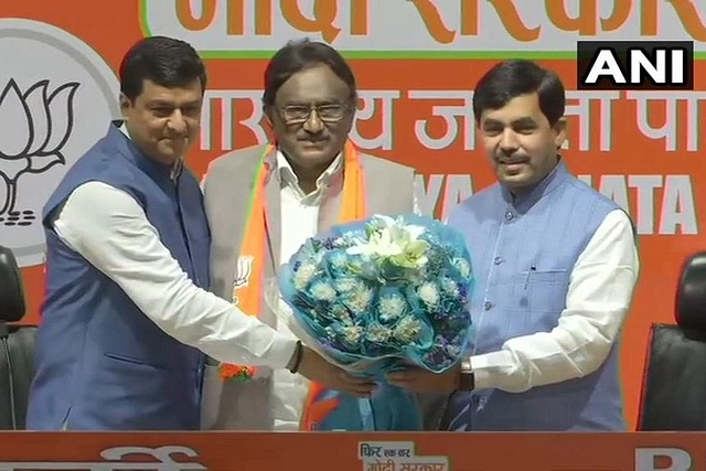 S Krishna Kumar joining BJP in presence of Syed Shahnawaj Hussain and Anil Baluni (@ANI/Twitter)