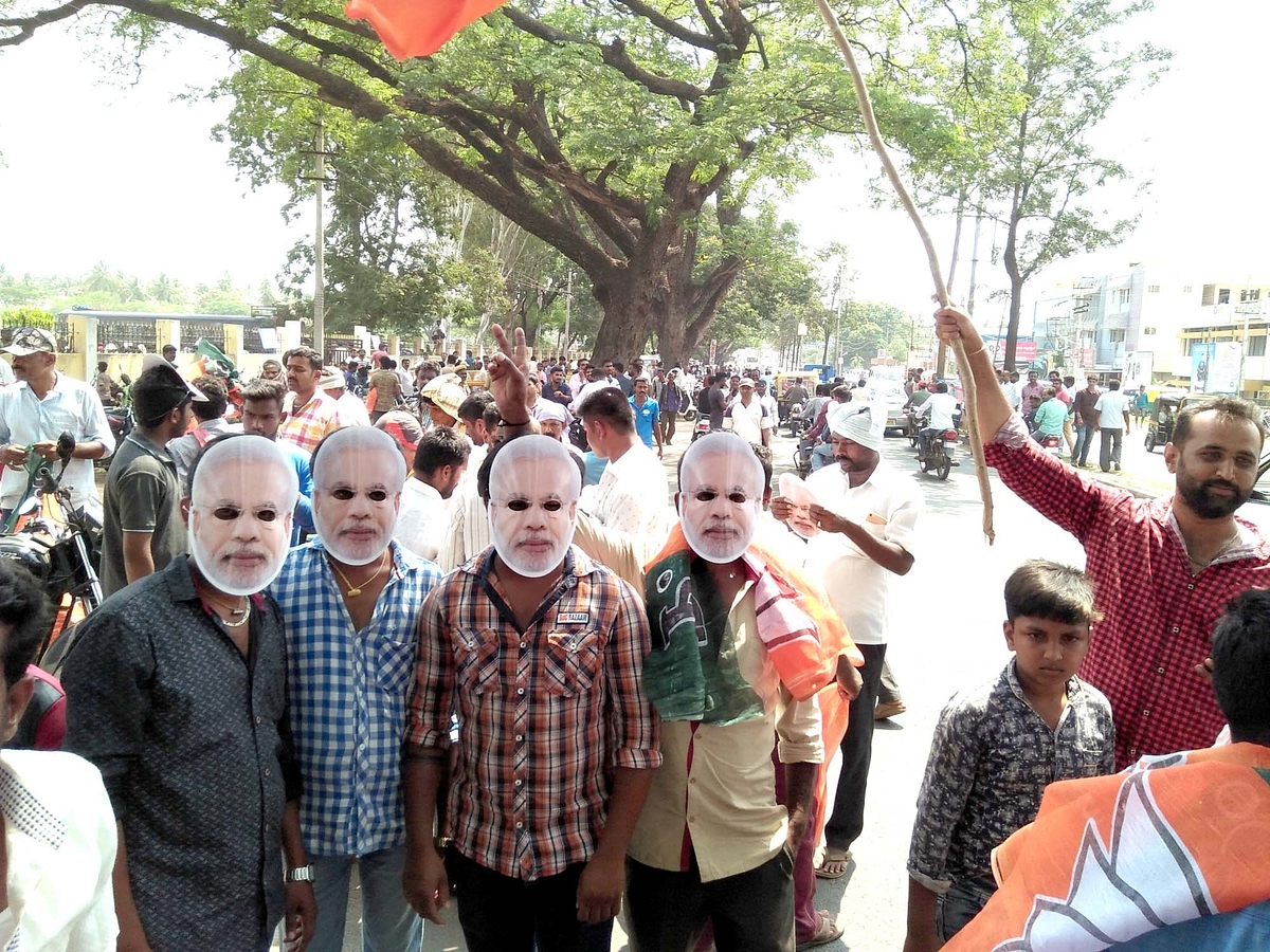 Supporters celebrate the victory of the BJP in the state and country.&nbsp;