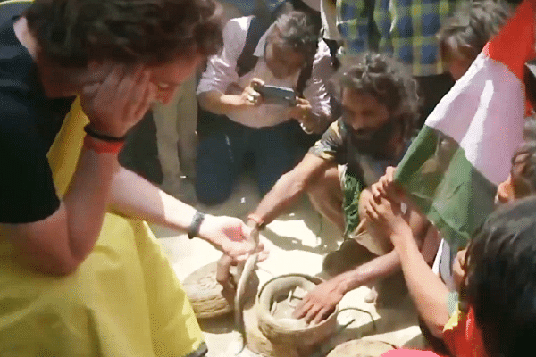 Screengrab of Priyanka Vadra holding snakes (@ANI/Twitter)