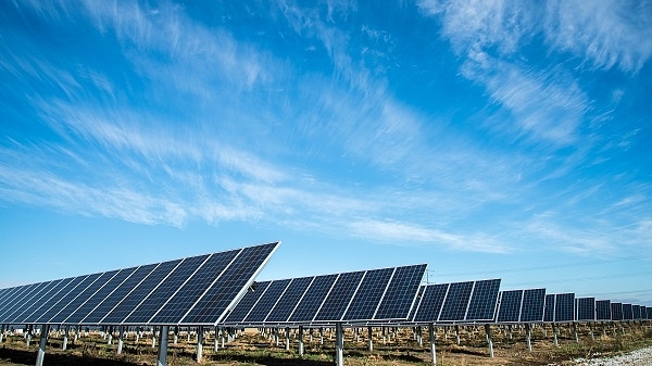 Solar panels arranged in a grid. (Unsplash/American Public Power Association)