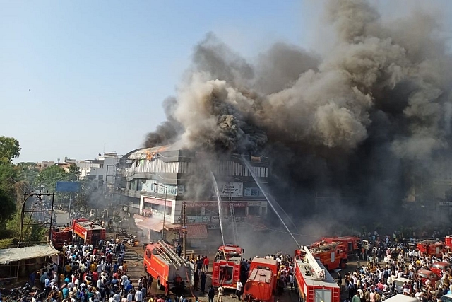 According to a fire official,19 fire tenders and two hydraulic platforms were rushed to the spot to douse the fire. (image via @wersurtis/Twitter)