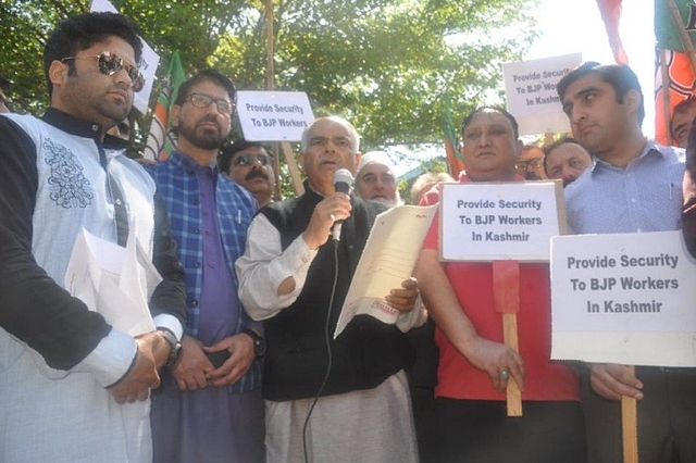 J&amp;K BJP leader Ashish Kaul protesting against the security withdrawal of political activists (@BJP4JnK/Twitter)