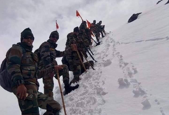 In Pictures: Indian Army Soldiers Brave Harsh Weather Clearing Snow For Gurdwara Hemkund Sahib In Chamoli Uttarakhand