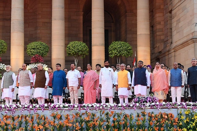 Prime Minister Narendra Modi with his new cabinet colleagues. (@PMOIndia)