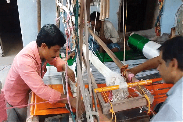 Rudrakshala Satyanarayana weaving the Tricolour. (Pic via Rudrakshala Satyanarayana YouTube Channel)