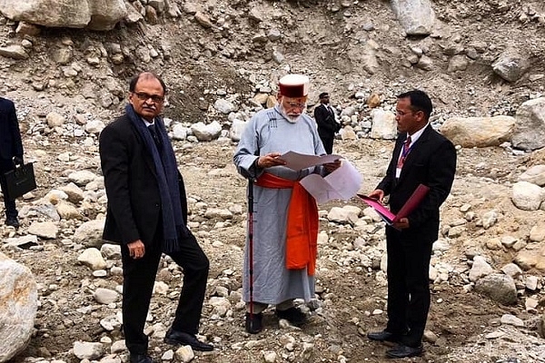 Prime Minister Narendra Modi taking stock of various construction programmes in Kedarnath.(Facebook picture) &nbsp;