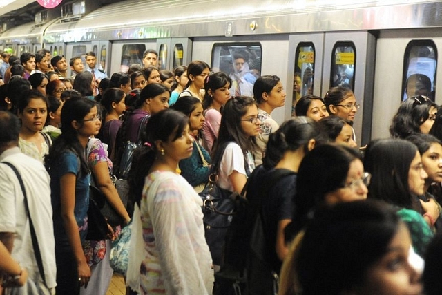 Women at a metro station.