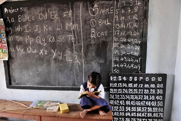 A child in a classroom.&nbsp;