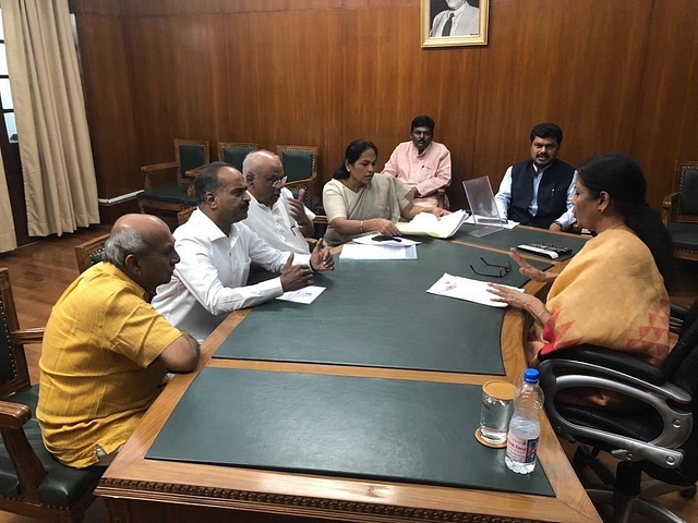 Finance Minister Nirmala Sitharaman interacting with MPs from Karnataka. (Image source:- Twitter/@PCMohanMP)