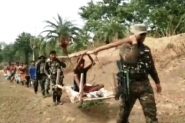 Boy being carried by CRPF jawans for treatment