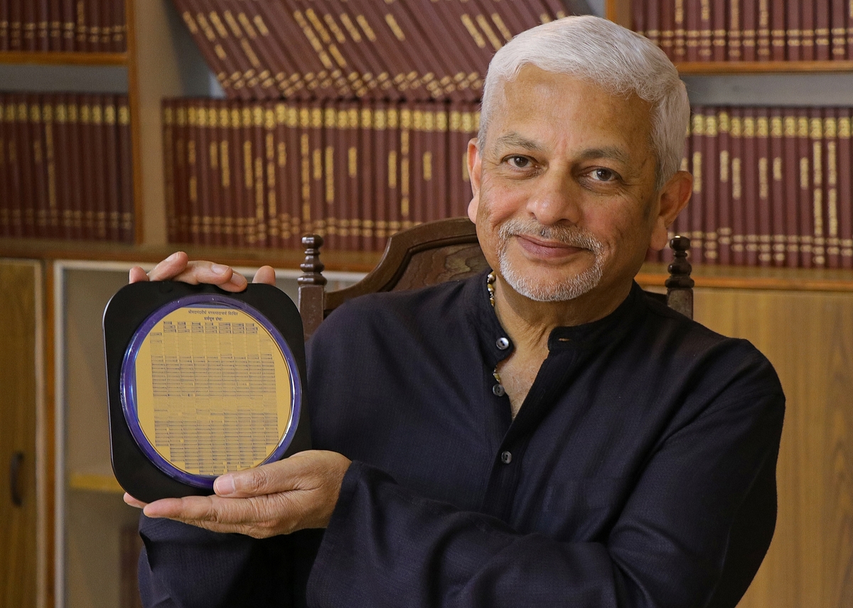 P R Mukund with the 800-year-old ‘Sarvamoola Grantha’ on a Waferfiche disk.
