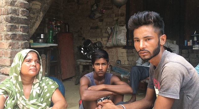 (Left to right) Savita with her younger son Alok and elder son Deepak