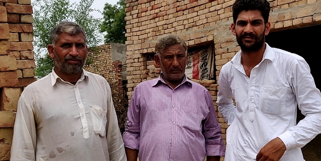 Joginder Kumar (centre) and Sunil Kumar (right).