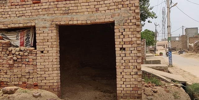 The family’s cattle shed that is now empty.