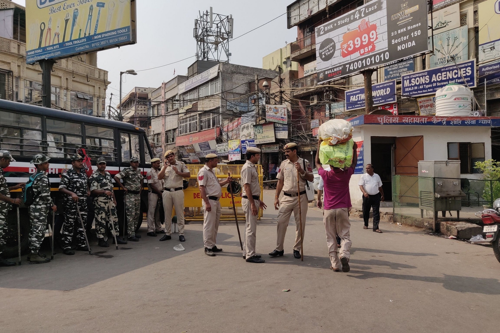 Police and paramilitary personnel at the entrance of Lal Kuan market in Delhi’s Chandni Chowk on Tuesday/Swarajya