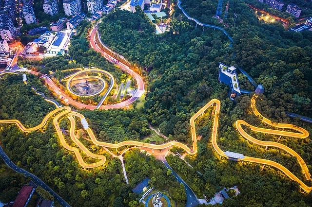 LED lights illuminate the Fuzhou Urban Forest Trail during the night in Meifeng Mountain Park, East China’s Fujian Province (via Twitter)