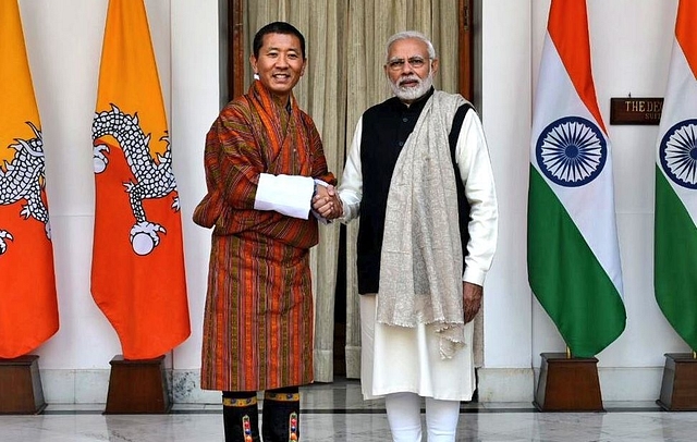 PM Narendra Modi welcomes PM of Bhutan  Dr Lotay Tshering (Image courtesy of twitter.com/MEAIndia)