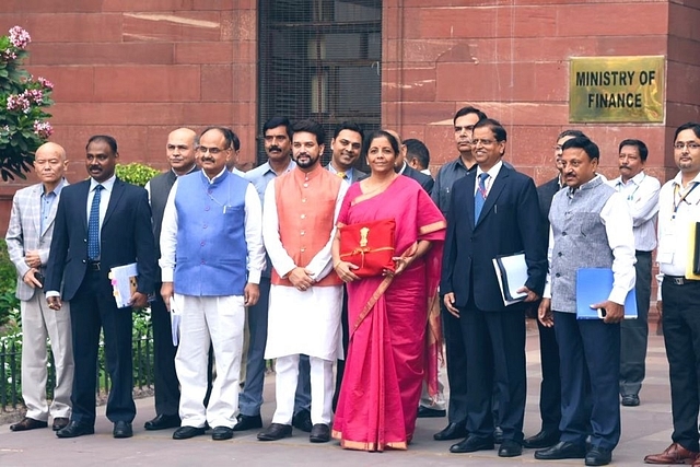 Union Finance Minister Nirmala Sitharaman carrying the Budget. (Source: @Anurag_Office/Twitter.com)