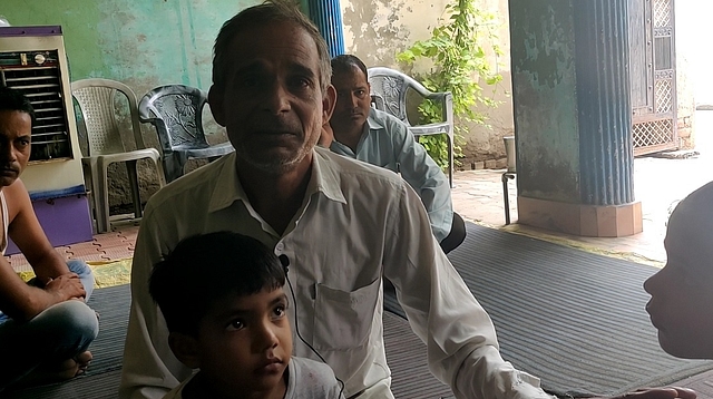 Satbir, Gopal’s cousin, with Gopal’s children
