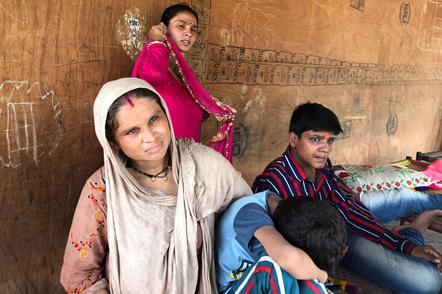 Radha with her children.