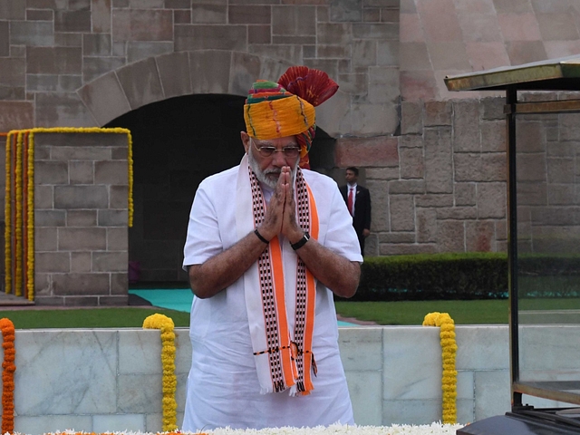 PM Modi at Raj Ghat before the speech. (via Twitter)