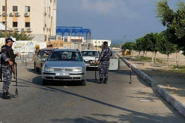 Policemen check vehicles in the Gaza strip following the suicide bombings. (Pic via Twitter)